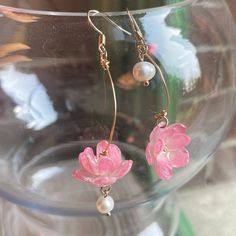 🌸 Introducing our exquisite Sakura Flower Earrings, featuring a charming pink color, creating a simple yet captivating design. 🌸 Each earring showcases meticulously beaded blooming flowers, displaying remarkable detail and an elegant aesthetic. 🌸 Crafted with hypoallergenic materials, these earrings ensure a comfortable and safe wearing experience. 🌸 The lightweight construction makes them suitable for both everyday wear and formal events. 🌸 Perfect for various occasions, including weddings, parties, or simply adding a touch of beauty to your daily outfits 🌸 Elevate your style effortlessly with these lightweight, easy-to-wear, and beautifully detailed Lotus Flower Earrings, providing an elegant and cute accent to any occasion. ✈️ Handling & Shipping usually takes about 10 days in tot Pink Dangle Flower Earrings Gift, Pink Dangle Flower Earrings For Gift, Pink Dangle Flower Earrings For Spring, Pink Drop Earrings For Birthday, Mother's Day Dangle Earrings With Flower Charm, Pink Dangle Flower Earrings For Mother's Day, Pink Gold Flower Earrings As Gift, Pink Flower Decoration Drop Earrings, Pink Gold Flower Earrings For Gifts