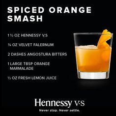 an orange drink is served in a glass with the names spiced orange smash on it