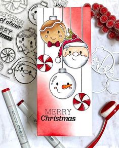 a christmas card with some candy canes next to it and other holiday stickers