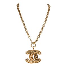 This 1993 vintage Chanel large quilted CC pendant necklace has 24K gold plated hardware, features a long 24K gold plated chainlink necklace with a large "quilted" engraved CC logo pendant.Origin: FranceCondition: Vintage; Excellent - Minor scratching and some discoloration to chainlink necklace.Accompanied by: Chanel boxMeasurements: necklace length: 15" ; CC pendant: 2.25" x 2" Metal Pendant Necklace With Gold-tone Logo Plaque, Gold Metal Necklaces With Gold-tone Logo Plaque, Gold-tone Logo Plaque Pendant Necklace, Vintage Gold Necklace With Gold-tone Logo Plaque, Luxury Gold Chain Necklace With Logo, Luxury Gold Chain Necklace With Logo Plaque, Vintage Gold-tone Necklace With Logo Charm, Luxury Chain Link Necklaces With Logo Charm, Pendant Necklace Gold