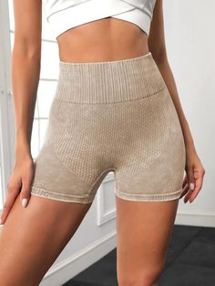 Features:Seamless \nActivity:Yoga & Studio \nWaist Line:High Waist \nFit Type:Skinny \nColor:Khaki \nPattern Type:Plain \nLength:Mini Shorts \nFabric:High Stretch \nMaterial:Fabric \nComposition:90% Polyamide \nComposition:10% Elastane \nCare Instructions:Machine wash, do not dry clean \nSheer:No \n Legging Shorts, Stretchy Shorts, Sports Shorts Women, Women Sports, Sports Shorts, Mini Shorts, Short Leggings, Yoga Studio, Wide Waistband