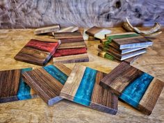 several pieces of wood sitting on top of a wooden table