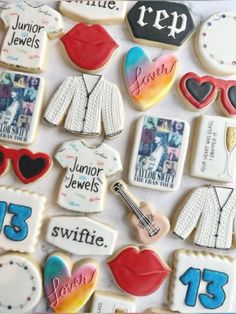 decorated cookies are arranged in the shape of women's clothing and accessories, with names on them