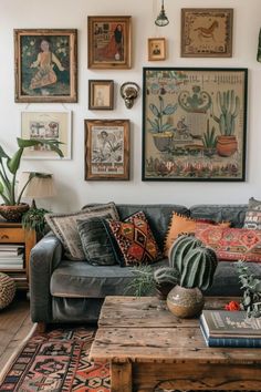 a living room filled with furniture and lots of pictures on the wall above it's coffee table