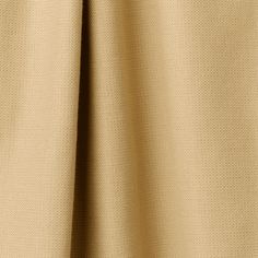 a close up view of a tan fabric