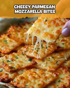 cheesy parmesan mozzarella bites being held up