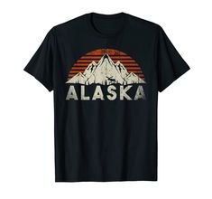 PRICES MAY VARY. Awesome Alaska design to show your love for the 49th state of the USA. For every Alaskan or for your next trip if you love nature, wildlife, hiking, adventures, camping, the outdoors, backpacking or exploring the glaciers and wilderness. Lightweight, Classic fit, Double-needle sleeve and bottom hem New Mexico Camping, Forest Graphic, Alaska Mountains, Retro Mountain, Outdoor Adventure Activities, Mountain Silhouette, Mountain Tshirt, Nature Shirts, Hiking Shirts