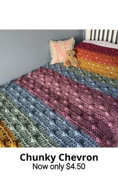 there is a crocheted bed with a teddy bear on it and the text chunk chevron now only $ 4 50