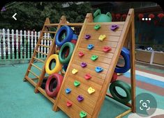 there is a climbing wall made out of wood