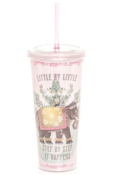 a plastic cup with a straw in the shape of a horse and carriage on it