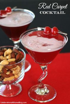 two glasses filled with red carpet cocktails