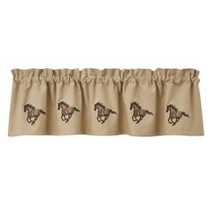 a curtain with horses drawn on it and the word's name in brown ink