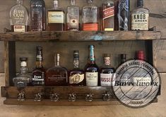 a wooden shelf filled with bottles of liquor