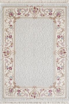 a white rug with pink flowers on it