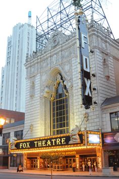 the fox theatre is lit up at night