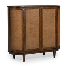 a wooden cabinet with two doors and some brown fabric on the front, against a white background