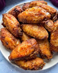 fried chicken wings on a white plate