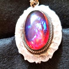 Over 1" X 5/8"W Cabachon Set In Sterling. Artisan Hand Hammered...Could Be Native American But Is Only Marked Sterling. ( Which Means It Is American As All Imports Have To Be Marked) Includes 18" 925 Chain. The Pictures Do This Opal No Justice!! Fire Opal Jewelry, Fire Opals Jewelry, Mexican Fire Opal, Opal Jewelry, Sterling Silver Pendant, Orange And Purple, Fire Opal, Sterling Silver Pendants, Womens Jewelry Necklace