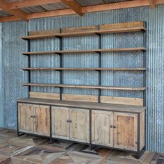 an old wooden bookcase with metal and wood shelves