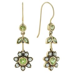 Beautifully and finely detailed vintage style peridot and pearl drop earrings set with total of 1.25 carat peridot and 1.6 carat pearl crafted in 9k yellow gold. A perfect complement to every wardrobe. Earrings Information Metal: 9K Yellow Gold (oxidized) Width: 11 mm. Length: 39 mm. Weight: 4.06 g. (approx. in total) Backing: French Wire Gemstones I Type: Peridot Shape & Size & Number: Round 3 - 4 mm. 4 pieces Marquise 4x2 mm. 4 pieces Weight: 1.25 Carat (approx.) Gemstones II Type: Pearl Shape: Round Size: 2.2 mm. Number: 16 Weight: 1.60 Carat (approx.) These earrings will be made to your order in 1-2 weeks, contact us to find out more. An attractive earrings box is included.  We dispatch all items via a secure and trackable for your item. You will receive a shipping notification after p Pearl Crafts, Pearl Vintage, Gold For Sale, Peridot Earrings, Earring Box, French Wire, Pearl Drop Earrings, Pearl Drop, Earrings Set