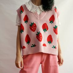 Knitted sweater vest with strawberries all over! S: 17" across shoulders, 41.5" chest, 22" length M: 17.5" across shoulders, 43" chest, 22.5" length L: 18" across shoulders, 44.5" chest, 23" length Strawberry Vest, Kogal Fashion, Aesthetic Sweaters, Sweater Vest Mens, Candy Theme, Summer Fun List, Fabric Textures, Holiday Sweater, Pink Sweater