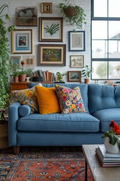 a living room filled with furniture and lots of pictures on the wall next to it