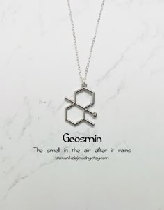 Molecule necklaces were featured on Buzzfeed and BUST magazine Geosmin Molecule Necklace in Silver. Petrichor is the term coined by Australian scientists in 1964 to describe the unique, earthy smell associated with rain. It is caused by the water from the rain, along with certain compounds like ozone, geosmin, and plant oils. Purchase includes a molecule information card, a natural jewelry box, and gift packaging. Gift? Add-on a hummingbird card for only $7: https://www.etsy.com/listing/20250697 Chemistry Necklace, Biology Jewelry, Molecule Necklace, Chemistry Jewelry, Science Jewelry, Unique Words Definitions, Information Card, Necklace Extender, Natural Jewelry