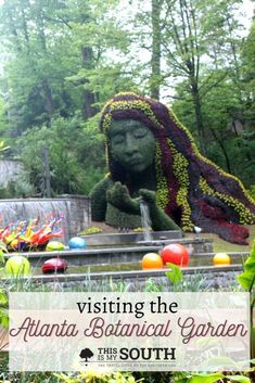 a statue with the words visiting the atlanta botanical garden in front of it and an image of