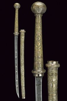 three different types of swords with intricate designs on the handles and sides, all in gold