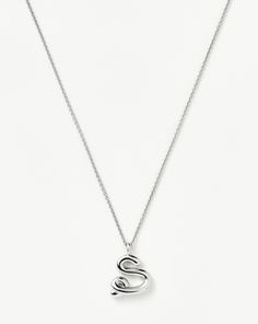 Curly Molten Initial Pendant Necklace - Initial S | Sterling Silver. Spell It Out. On a Delicate Trace Chain, this Unique Initial Pendant Necklace Features Your Chosen Letter in a Bespoke Hand-Drawn Font. A Versatile Layering Piece, Keep It for Yourself or Give as the Ultimate Personalized Gift. Metal: Recycled Sterling Silver on Brass Dimensions: 16 mm X 17. 4mm Total Length: 500mm with 40mm Continuous Extension from 460mm - 500mm Weight: 8g Product Code: Inl-S-N2-Ns-S Initial S, Sterling Silver Initial, Pearl Necklace Earrings, Necklace Initial, Earring Trends, Initial Pendant Necklace, Demi Fine Jewelry, Gold Price, Initial Pendant