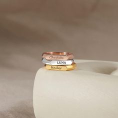 Our personalized signet name ring offers a timeless, elegant design with a custom-engraved name for a unique touch. Crafted with care, it's the perfect blend of sophistication and sentiment, making it an ideal gift or keepsake to treasure. PRODUC DETAILS: - Dimensions: engraving space: 3mmx14mm - Band ring measures approx 1.2mm - HOW TO ORDER AND SEND US INSTRUCTION FOR PERSONALIZATION-- - Select the color and size you would like at the drop down options. - Include in the "Add your personalizati Name Ring, Stackable Name Rings, Christmas Ring, Mom Ring, Name Rings, Personalized Gifts For Her, Stackable Rings, Lower Case Letters, Ideal Gift