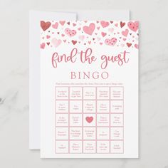 a pink and red printable wedding game with hearts on the side, in front of a white background