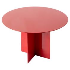 a round table with a red base is shown against a white background, it appears to be an abstract piece of art