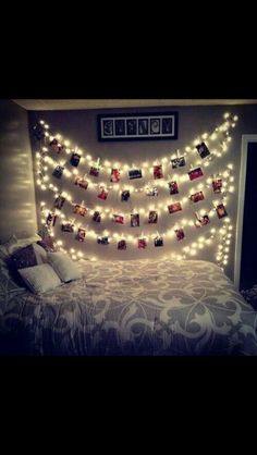 a bed with lights and pictures on it