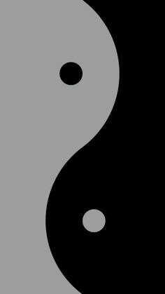 the yin symbol is shown in black and grey colors, as well as white dots