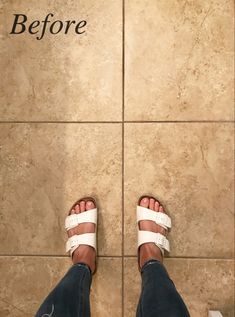 a person standing in front of a tile wall with the words before and after written on it