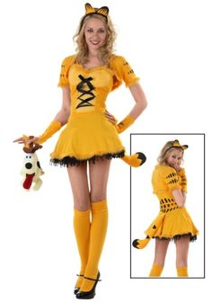 a woman dressed in a yellow costume and holding a stuffed animal is posing for the camera