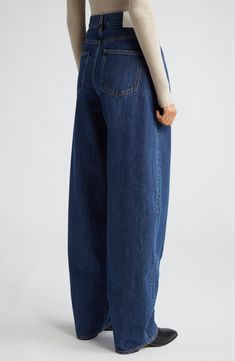 Relaxed yet dramatic, these mid-wash jeans are crafted from nonstretch Italian denim with a high waist and full-length tapered legs. 34" inseam; 17" leg opening; 11 1/2" front rise; 14" back rise (size 26) Zip fly with button closure Front scoop pockets; coin pocket 100% organic cotton Hand wash, line dry Made in Italy Designer Clothing This brand has B Corp certification, representing business practices with emphasis on social and environmental performance, accountability and transparency This Modern High Rise Blue Jeans, Modern High Waist Denim Jeans, Modern High-rise Denim Blue Jeans, Modern High Rise Denim Blue Jeans, Modern Rigid Denim Cropped Jeans, Modern High Rise Jeans In Recycled Denim, Modern Cropped Tapered Leg Denim Jeans, Modern Cropped Tapered Leg Jeans, Modern Tapered Leg Cropped Denim Jeans