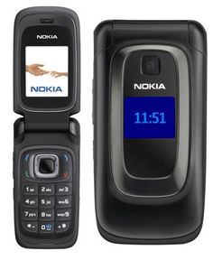 an old nokia cell phone with the number 11 511 on it's screen