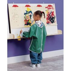 Childcraft presents an all-birch panel wall-mounted easel with white melamine easel surface. Includes built-in clips for your convenience. The lower ledge holds 8 paint cups. Made with dado construction and stain-resistant four-coat UV acrylic finish. Full easel measures 48-7/8 W x 10 D x 27-3/8 H inches. Weighs 40 pounds. Assembly and mounting required. Offers a lifetime guarantee against manufacturing defects. Childcraft | Childcraft Board Easel 27.0 H x 47.63 W x 10.0 D in brownWood | 47.63" Outdoor Art Easel, Paint Cups, 21st Century Classroom, Childhood Art, Welcome To School, Primary Activities, Painted Trays, Art Easel, Painted Cups