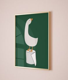 a white duck sitting on top of a toilet paper dispenser next to a green wall