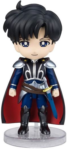 a toy figurine that looks like an action hero with black hair and blue eyes