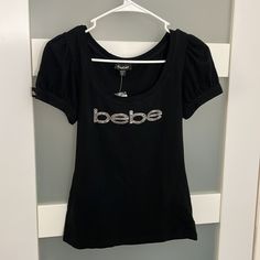 Bebe Women's Black T-Shirt New With Tags Bebe Shirt, Bebe Shirts, Bling Top, Silver Shorts, Purple Tee, Seamless Top, Rhinestone Top, Mesh Crop Top, Sport Tank Tops