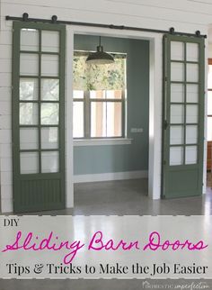 an open door with the words sliding barn doors tips and tricks to make the job easier