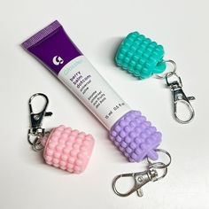 Take your lip care everywhere with the Keychain Lip Balm Holder, designed to fit your Glossier lip balm tube! Perfect for clipping onto your lanyard, keys, or bag for quick access and ultimate convenience. 🔒HOLDS ON TIGHT Replace your original cap with this threaded design that screws on securely (doesn't slide over) and features a built-in stopper to prevent spills. 🤲 SUPER COMFY GRIP The easy-to-hold shape makes opening and closing smooth and effortless--even when you're on the move. 🔗 TANG Glossier Balm Dotcom, Glossier Lip Balm, Preppy Gifts, Sephora Skin Care, Lip Balm Tubes, Beauty Marketing, Lip Balm Holder, Balm Dotcom, Pink Vibes