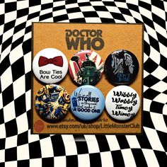 the doctor who button set is displayed on a black and white checkered background