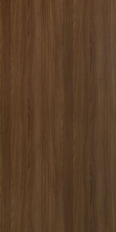 a close up view of the wood grain pattern on this wallpapered surface, which is very dark brown