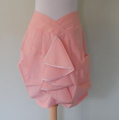 'Peach skirt' A darling little chiffon bauble skirt in peach, with ribbon detail and a zip up side. Great for formal occasions. Measurements taken while lying flat. Length 16' or 41cm Width accross waist 16' or 41cm THIS IS A ONE OFF BRAND NEW HANDMADE ITEM. Pink Swim Skirt With Built-in Shorts, Pink Relaxed Mini Skirt With Gathered Detail, Peach Skirt, Black Velvet Dress, Formal Occasion, Velvet Dress, Black Floral, Size 10, Zip Ups