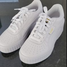 Highly Rated.. True To Size. Puma Cali White, Puma High Tops, Puma Tennis, Puma X Ray, Slip On Tennis Shoes, Puma Carina, Puma Cali, Metallic Sneakers, Tennis Sneakers