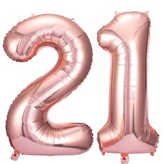 the number twenty two is made out of foil balloons and it looks like they are floating in the air